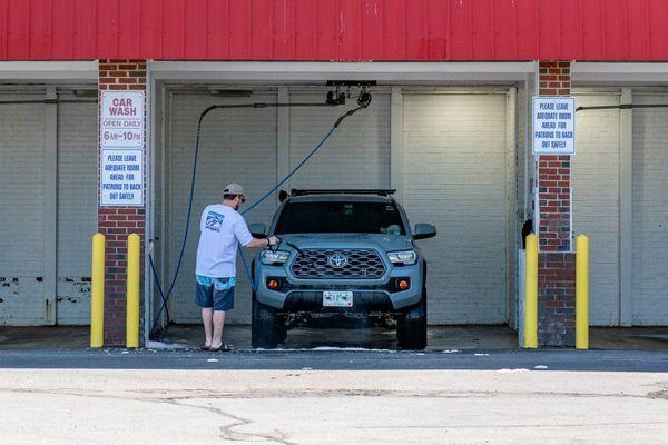 Self serve bays to so you can clean your car as you want it.