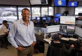 Houston Chronicle Image of Craig Taylor on Atlas Commodities LLC brokerage floor.