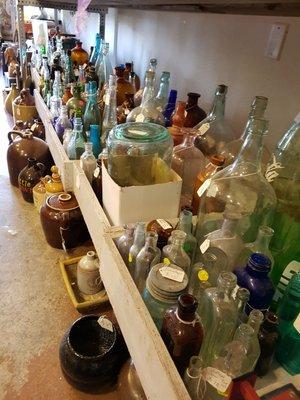 Lots of glass bottles