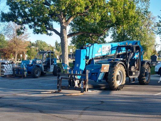 Matching big and Small Genie Telehandlers 5519 - 19' 5500lbs 1056 - 56' 10,000lbs