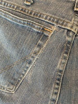 Hole repair on jeans.