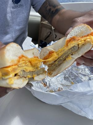 Plain bagel with sausage, egg, and American cheese