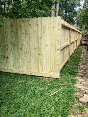 Conroe TX Fence contractors near Conroe, TX installed a privacy cedar fence with cedar posts.