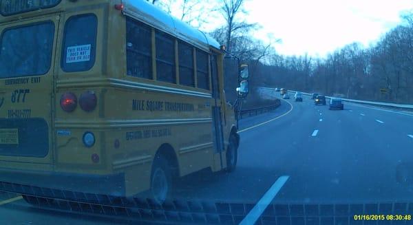 School bus driving at an excessive speed in the left lane on the Sprain Brook.