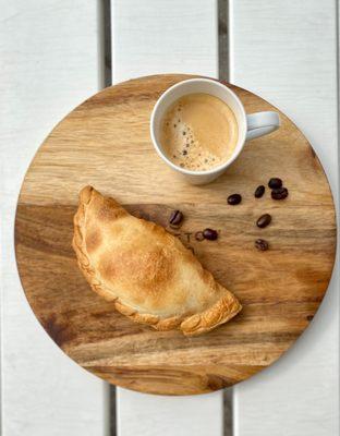 Empanada with coffee