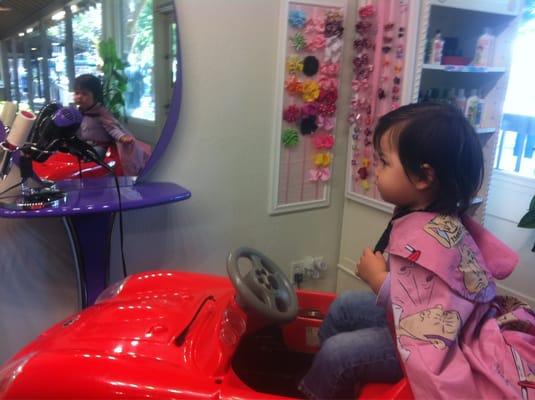 The kids loved sitting in the car chair.