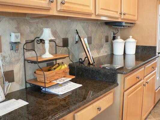 These metal decorative accents work well with this traditional kitchen