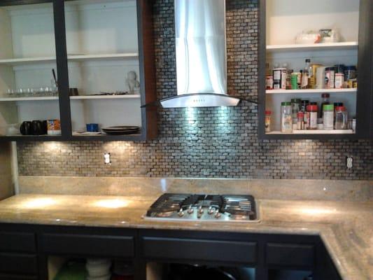 Mosaic tile install and range hood install