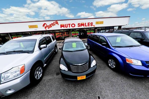 A photo of some of our vehicles and our office.