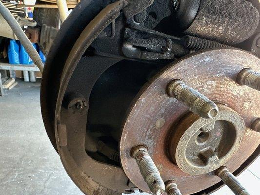 This shows the actual rear brakes that were never done.