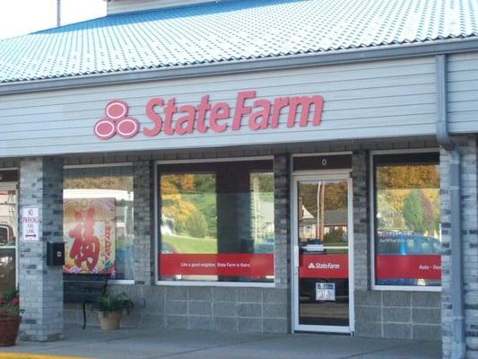 Fall colors reflecting in the windows along with new logo at The Hile Agency - Bart Hile State Farm in Indianapolis.