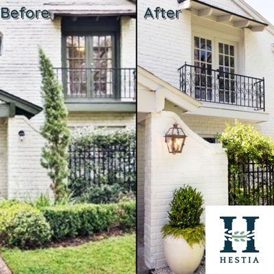 This exterior remodel got a fresh coat of white paint, updated balcony with metal awning, landscaping, gravel sidewalk, and smooth stucco.