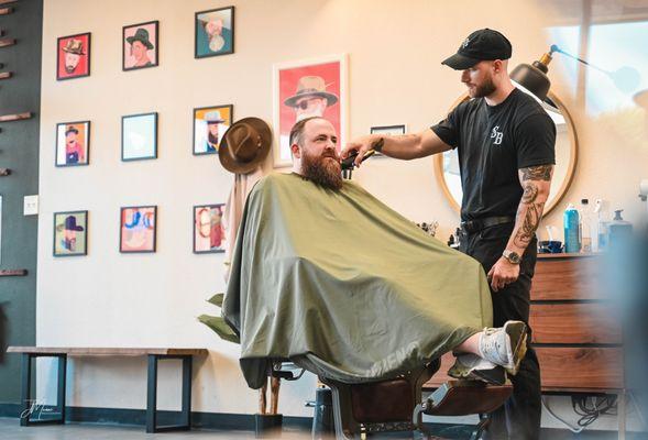 adding final touching to a beard trim.