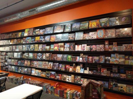 Base games on the wall, expansions underneath