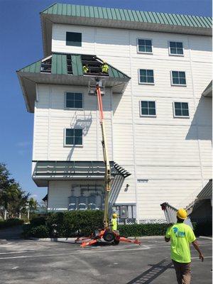 Titan Restoration Construction helping this marina repair damage to their roof due to storms.