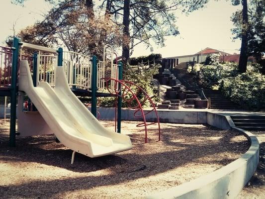 Playground near King Pool, with a staircase in the background that leads up to MLK Jr. Middle School!