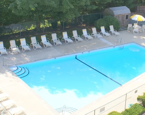 Nice outdoor pool with lifeguards on duty