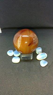 Carnelian sphere with drusy pocket