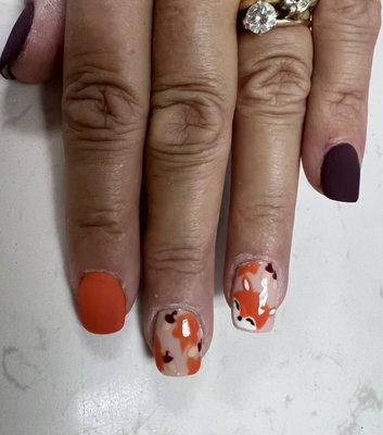 Cute fall nails! Katie can paint anything.