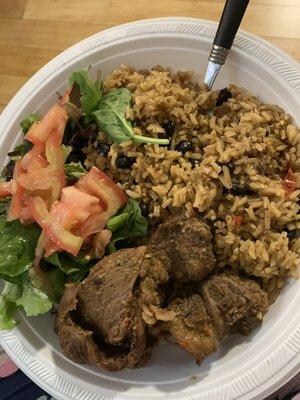 Yellow Rice Mixed with black beans a green salad and sautéed steak ...