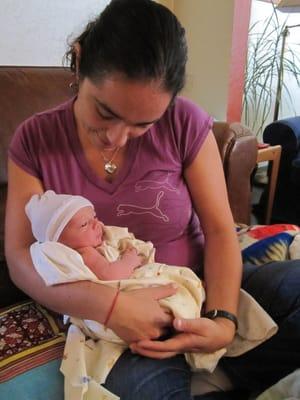 Eva holding Enrico at our day 2 post birth visit