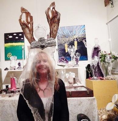 This is Me, Lynda*Star,  the Owner, Angel Artist, and Healer, looking through my 36 inch Archangel Michael, before his wand (...