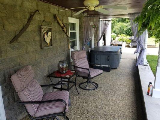 Nice porch area with your own personal jacuzzi!