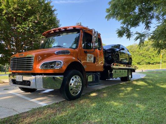 Our 2023 Freightliner M2 hauling a 2024 BMW XM. We are well equipped and adept at moving highly exotic vehicles!