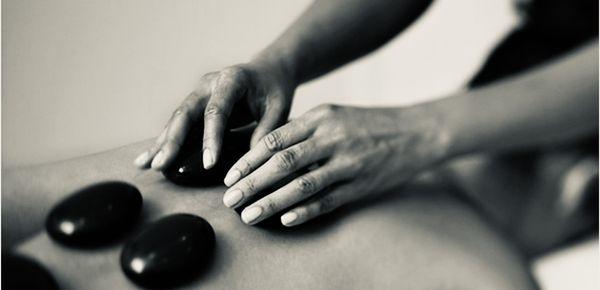 Therapeutic hot stone massage therapy