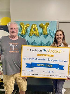 Nancy Celebrates with her patient with a Graduation Photo