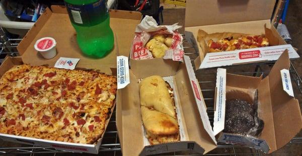 The feast!
Real photo of our meal cooked by the friendly staff at Domino's in Roswell, NM