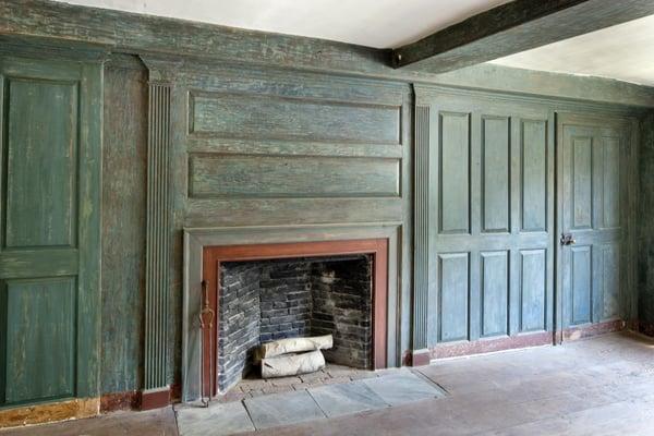 Interior fireplace of the Barrett Farm. Alpine carefully stripped dozens of layers of paint to reach the original.