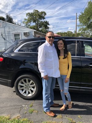 My gorgeous wife and Our beautiful town car and driver Mark for the evening.