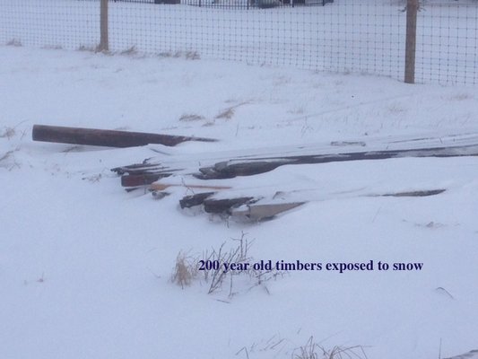 Photo of barn timbers exposed to weather