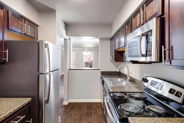 Kitchen area at The Heritage at Hillcrest apartments in Austin, TX