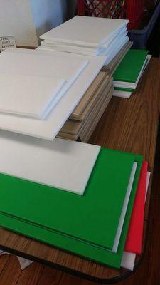 Cutting board colors include white, red, green, beige, yellow, blue.  1/2" to 1" thickness