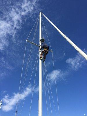 Jeff climbing the mast to check out.