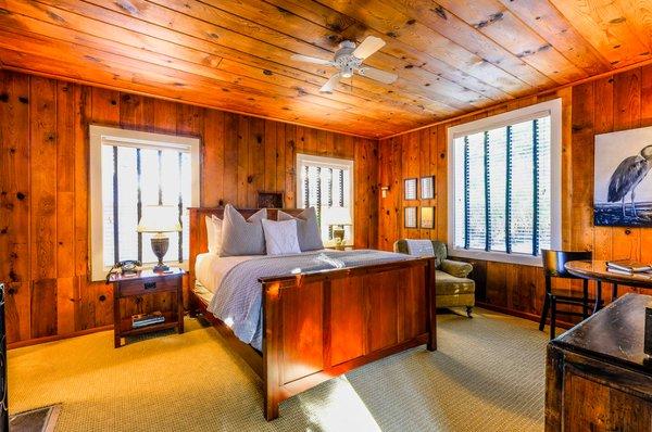 Warm wood and preserved historic details in each of the six unique guest rooms.