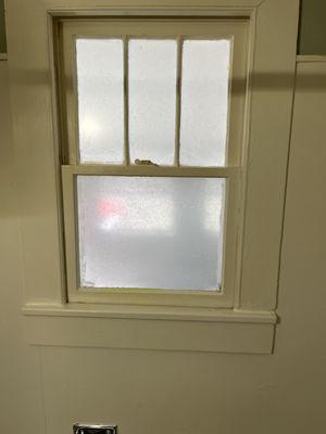 Bathroom window after fogging for privacy