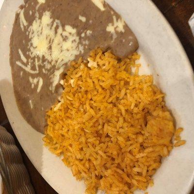 Side order of rice and authentic refried beans