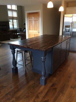 Reclaimed chestnut counter top with a painted maple cabinet