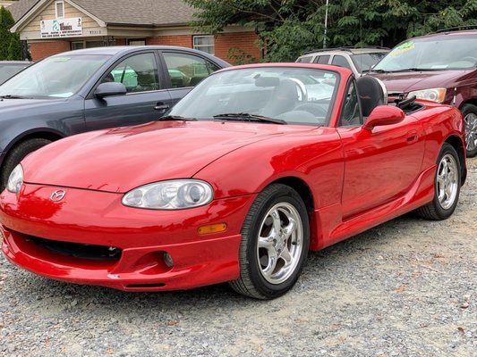 Red convertible Miata