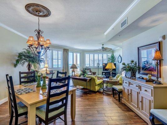 Dining room and living room at Mediterranea Condominium 414E in Miramar Beach, FL