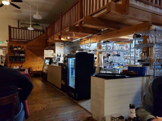 The kitchen is within view of the dining area.