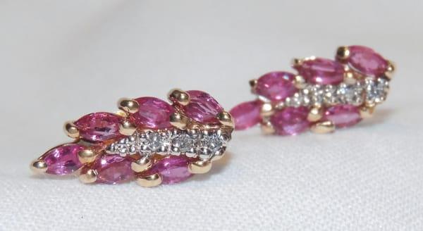 A beautiful pair of diamond and ruby earrings.