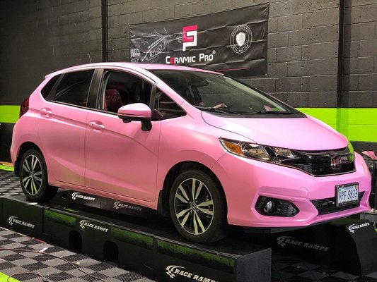 2020 Honda Fit wrapped in Avery Dennison Satin Bubblegum Pink.