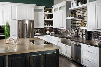 Model kitchen displaying flooring, tile and countertops.