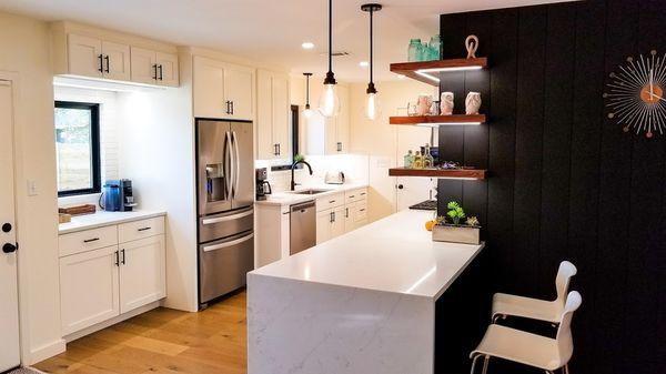 Complete kitchen remodel came out beautifully. New windows, cabinets, counters, backsplash and floor to make this space beautiful.