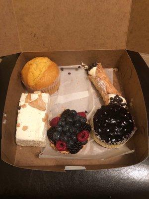 Cannoli, blueberry cheesecake cup, fruit tart, cannoli cake slice, corn muffin