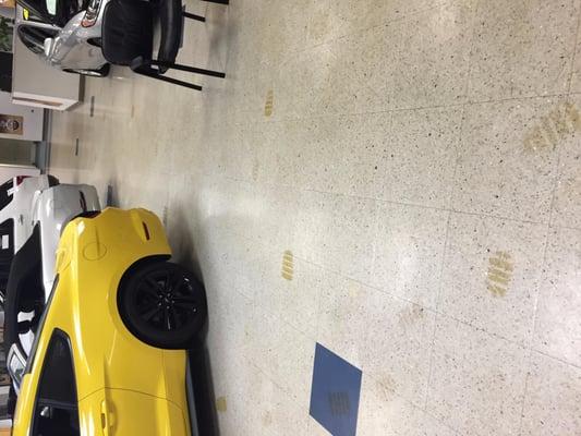 Dealership Floor Waxing Before Waxing